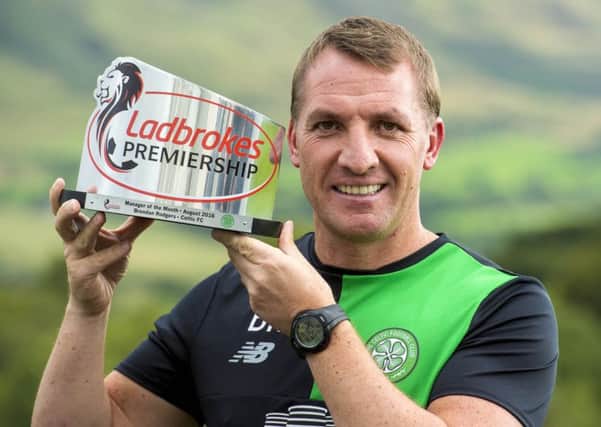Celtic manager Brendan Rodgers with the Ladbrokes Premiership Manager of the Month award for August. Picture: Alan Harvey/SNS