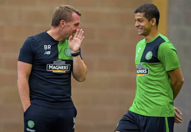 Celtic manager Brendan Rodgers, left, jokes with summer signing Cristian Gamboa in training. Picture: SNS Group