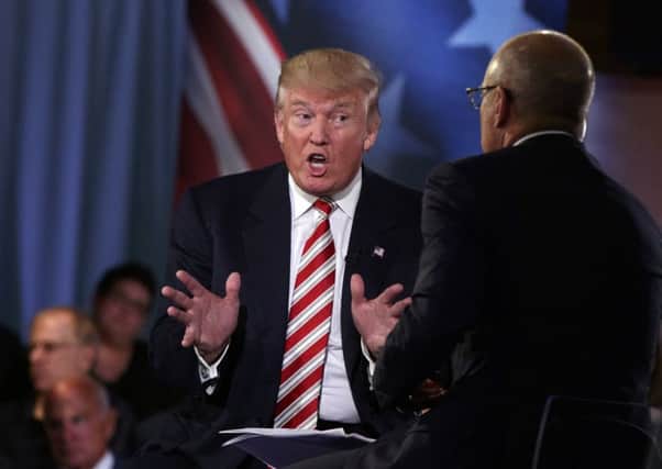 Donald Trump speaks with 'Today' show co-anchor Matt Lauer at the NBC Commander-In-Chief Forum. Picture:  AP Photo/Evan Vucci
