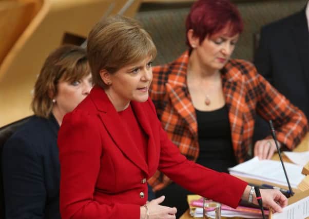 First Minister Nicola Sturgeon is threatening to move for Indyref2 if Scotland if taken outside the single market. Picture: PA