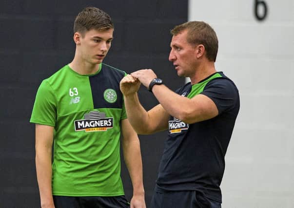 Kieran Tierney, pictured with manager Brendan Rodgers, is the key player for Celtic, according to Neil McCann. Picture:  Alan Harvey/SNS