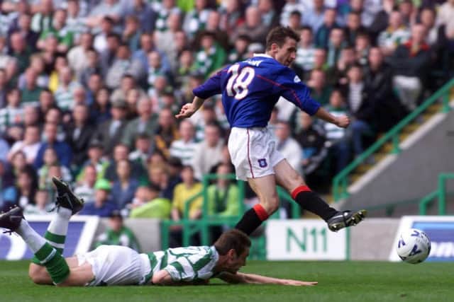 Celtic are floored as 
Neil McCann scores in the 3-0 win which saw Rangers clinch the title at Parkhead in May 1999. Picture: Gareth R Reid