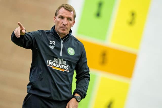 Brendan Rodgers points the way in training ahead of his first Old Firm derby as Celtic manager. Picture: SNS Group