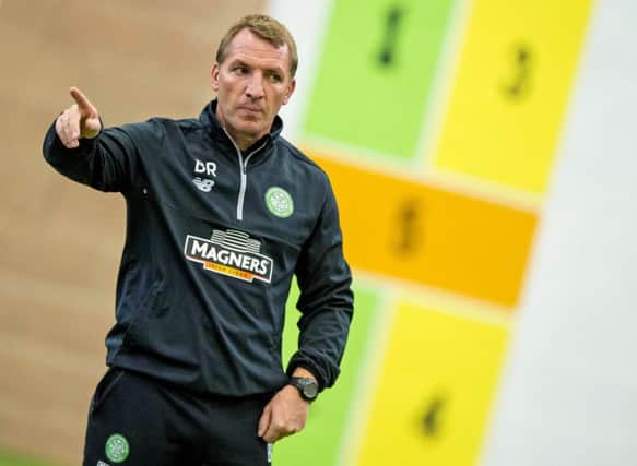 Brendan Rodgers points the way in training ahead of his first Old Firm derby as Celtic manager. Picture: SNS Group