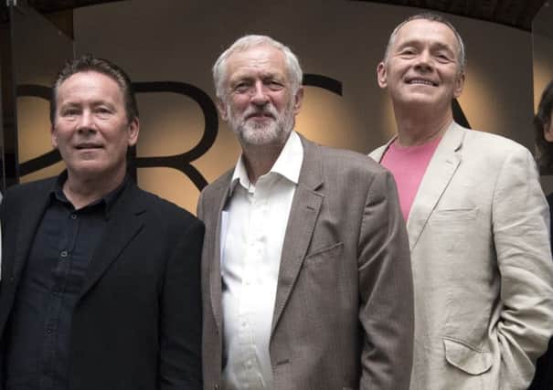 Corbyn flanked by Robin and Duncan Campbell, who split acrimoniously with their brother and fellow band member, Ali Campbell, in 2008. Picture: Carl Court/Getty