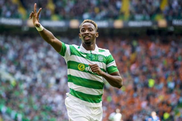Moussa Dembele celebrates after scoring.