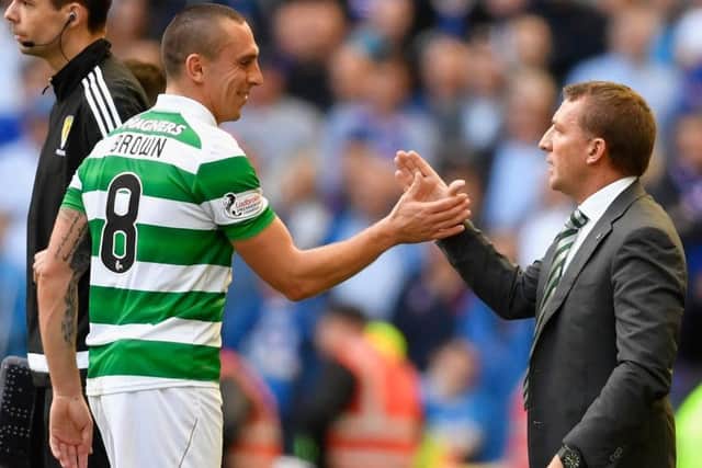 Celtic manager Brendan Rodgers shakes hands with captain Scott Brown. Picture: Jeff J Mitchell/Getty Images