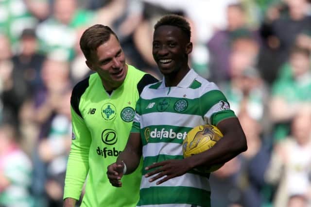 Celtic Moussa Dembele, right, celebrates with Dorus De Vries after the final whistle. Picture: Andrew Milligan/PA Wire