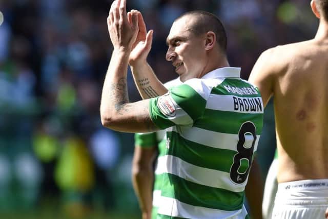 Celtic captain Scott Brown applauds the fans after the 5-1 win over Rangers/ Picture: Rob Casey/SNS