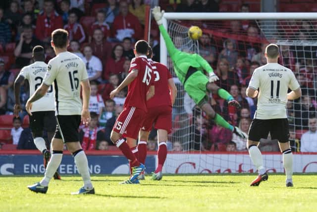 Iain Vigurs scores a long-range strike to equalise for Inverness. Picture: Ross Parker/SNS