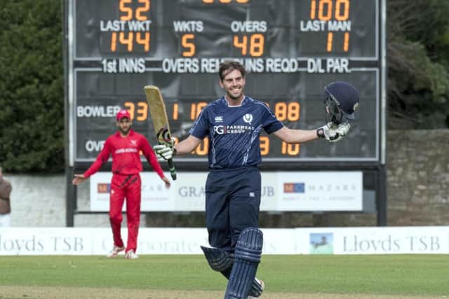 Scotland's Calum MacLeod acknowledges the crowd after his century against Hong Kong. Picture by Donald MacLeod/Cricket Scotland
