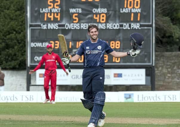 Scotland's Calum MacLeod acknowledges the crowd after his century against Hong Kong. Picture by Donald MacLeod/Cricket Scotland