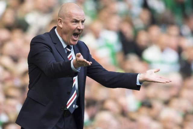 Mark Warburton cuts a frustrated figure as Rangers were outclassed at Celtic Park. Pic: SNS