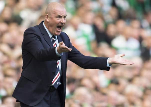 Mark Warburton cuts a frustrated figure as Rangers were outclassed at Celtic Park. Pic: SNS