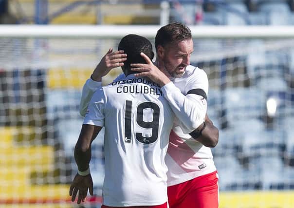 Souleymane Coulibaly embraces Kris Boyd after netting for Kilmarnock. Pic: SNS