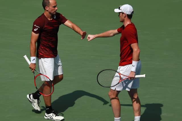 Jamie Murray, right, and Bruno Soares beat Pablo Carreno Busta and Guillermo Garcia-Lopez of Spain to win the men's doubles final at the US Open. Picture: Michael Reaves/Getty Images