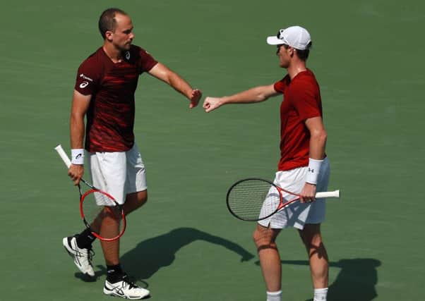 Jamie Murray, right, and Bruno Soares beat Pablo Carreno Busta and Guillermo Garcia-Lopez of Spain to win the men's doubles final at the US Open.  Picture: Michael Reaves/Getty Images