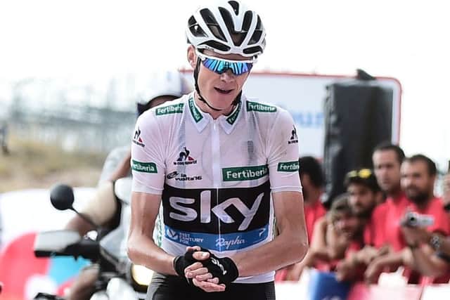 Chris Froome applauds Nario Quintana's ride at the end of the stage.