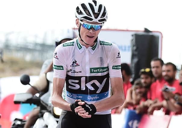 Chris Froome applauds Nario Quintana's ride at the end of the stage.