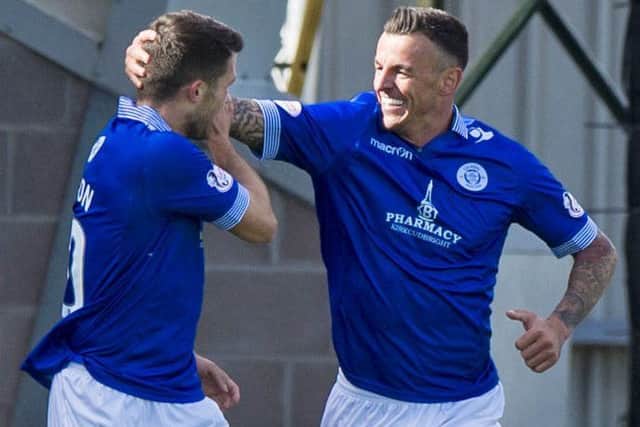Derek Lyle, right, celebrates after firing home to give Queen of the South the lead against St Mirren. Picture: Sammy Turner/SNS