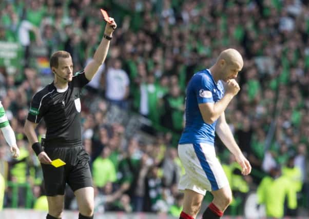 Rangers' Philippe Senderos is sent off for a second booking by referee Willie Collum. Picture: Jeff Holmes/PA Wire