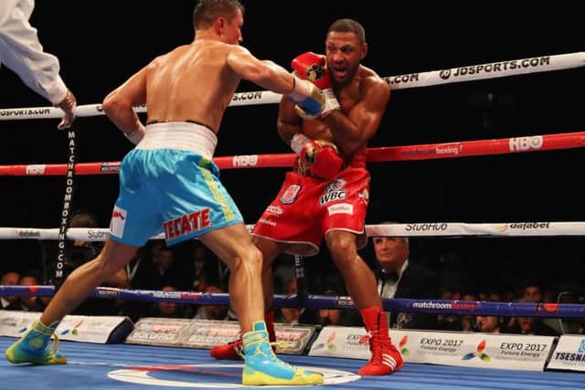 Gennady Golovkin (blue trunks) takes the fight to Kell Brook during their world middleweight title contest at the O2 Arena.  Picture: Richard Heathcote/Getty Images