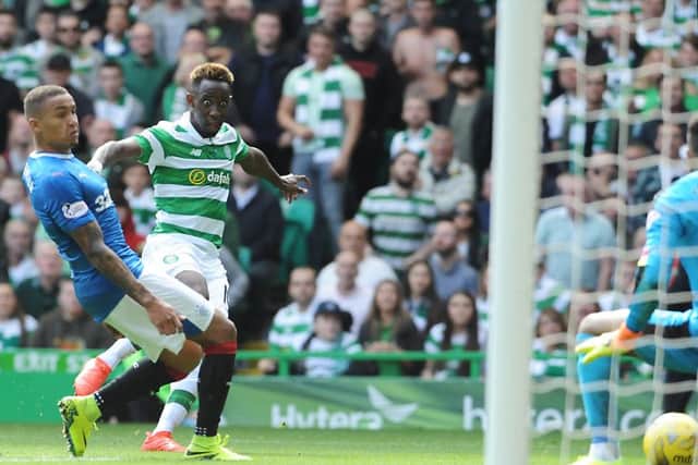 Dembele completes his hat-trick with a left-foot shot past Rangers goalkeeper Wes Foderingham. Picture: John Devlin