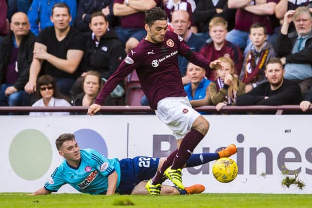 Hearts striker Tony Watt evades the challenge of Hamiltons Darren Lyon during the Edinburgh sides 3-1 victory at Tynecastle on Saturday. Picture: SNS