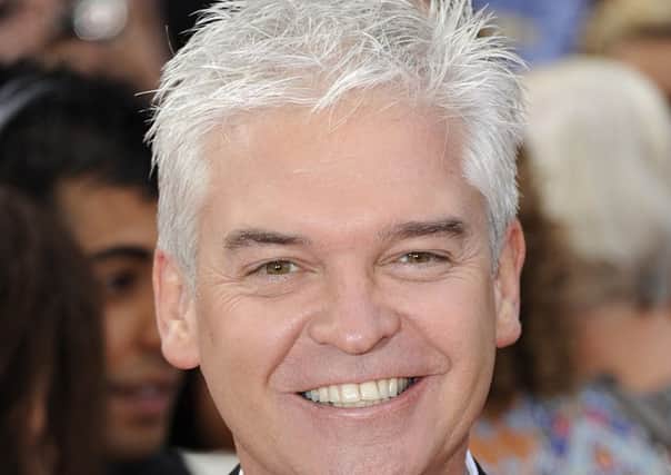 Phillip Schofield finally gave in to the reality of grey hair at the age of 44