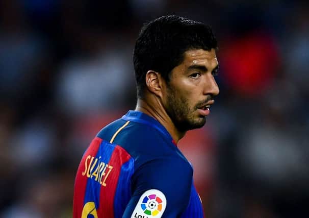 Luis Suarez and his Barcelona team-mates will come up against Celtic tomorrow night in the Champions League. Pic: Getty