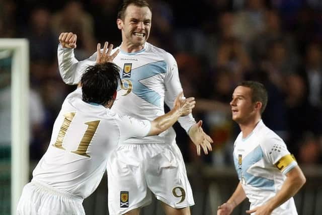 James McFadden celebrates with Paul Hartley after scoring. Picture: Getty Images / Franck Fife