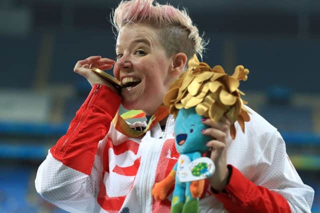 Great Britain's Joanna Butterfield celebrates on the podium with her gold medal for the women's club throw at the Paralympics. Picture: Adam Davy/PA Wire