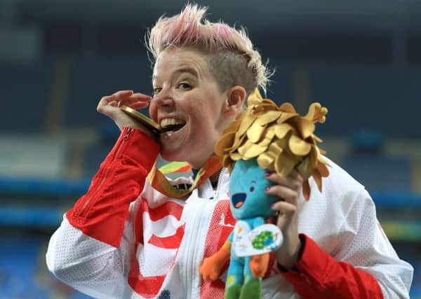 Great Britain's Joanna Butterfield celebrates on the podium with her gold medal for the women's club throw at the Paralympics. Picture: Adam Davy/PA Wire