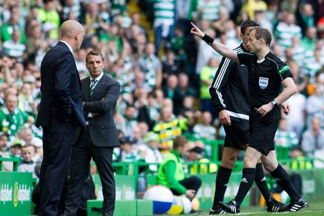 Mark Warburton looks on as referee Willie Collum sends Rangers assistant David Weir to the stands in Saturday's Old Firm derby. Picture: Kirk O'Rourke