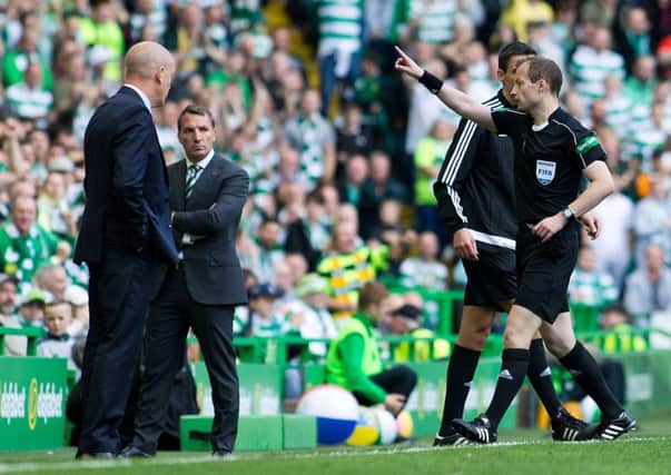 Mark Warburton looks on as referee Willie Collum sends Rangers assistant David Weir to the stands in Saturday's Old Firm derby. Picture: Kirk O'Rourke