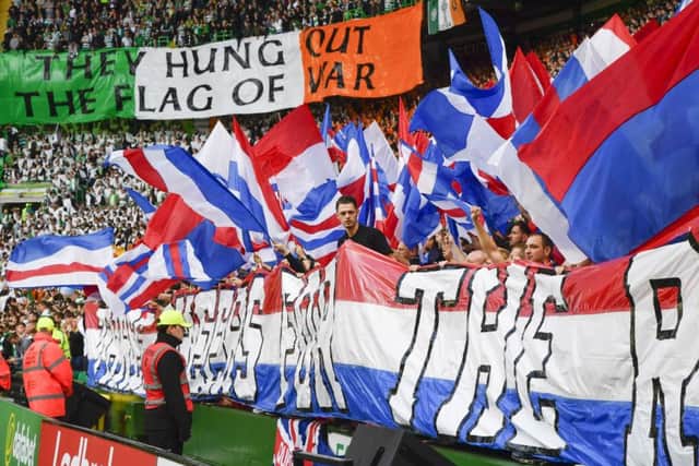Celtic and Rangers fans during Saturday's Old Firm game. Picture: SNS