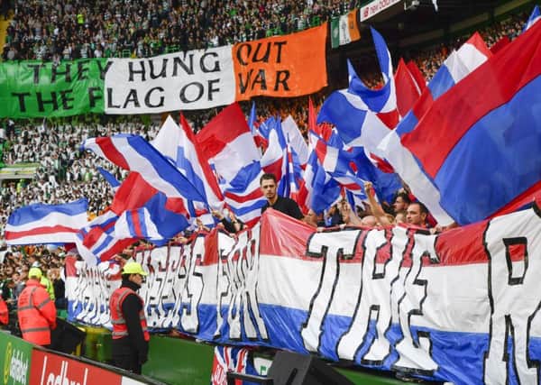 Celtic and Rangers fans during Saturday's Old Firm game. Picture: SNS