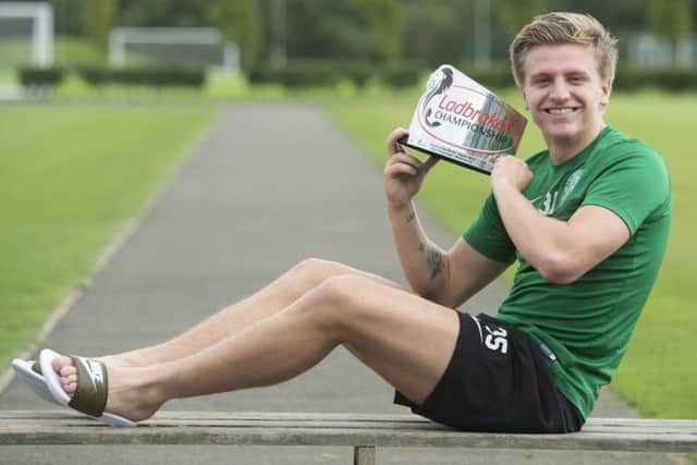 Jason Cummings collected his Championship player of the month award yesterday. Picture: SNS.