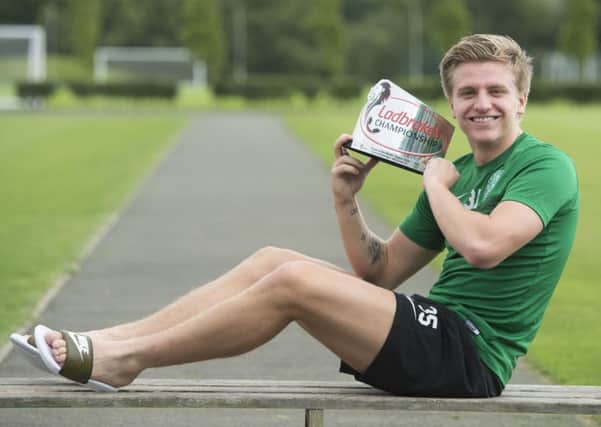 Jason Cummings collected his Championship player of the month award yesterday. Picture: SNS.