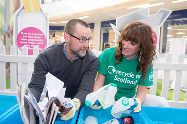 Ian Gulland of Zero Waste Scotland with radio DJ Gina McKie at a recycling event in Glasgow. Picture: Lenny Warren