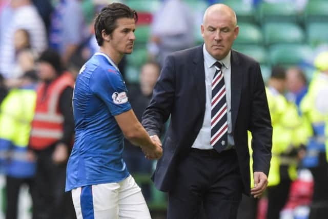 Rangers manager Mark Warburton, right, pictured alongside midfielder Joey Barton, has vowed to turn it around at Rangers. Pic: PA