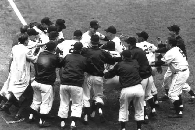 Bobby Thomson (back and centre) is congratulated by the New York Giants after his 'shot heard around the world'. Picture: Contributed