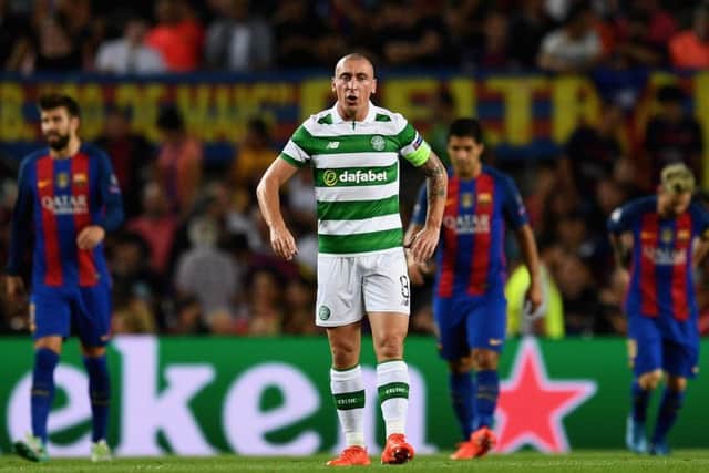 Scott Brown surveys the damage as Celtic lose 7-0 in the Nou Camp. Picture: Getty
