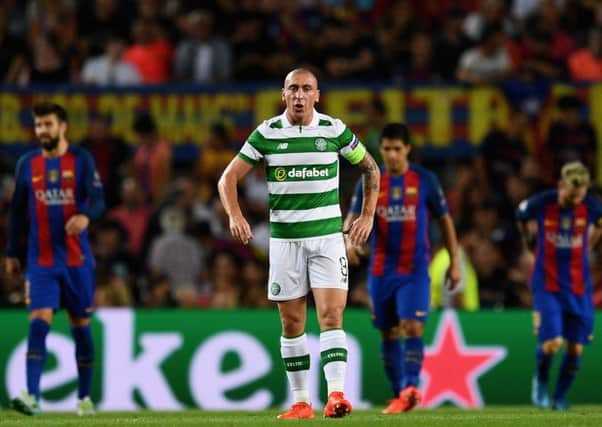 Scott Brown surveys the damage as Celtic lose 7-0 in the Nou Camp. Picture: Getty