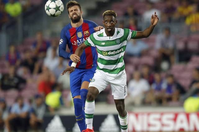 Celtic's Moussa Dembele, right, is believed to be tracked by Barcelona and Real Madrid. (AP Photo/Manu Fernandez)
