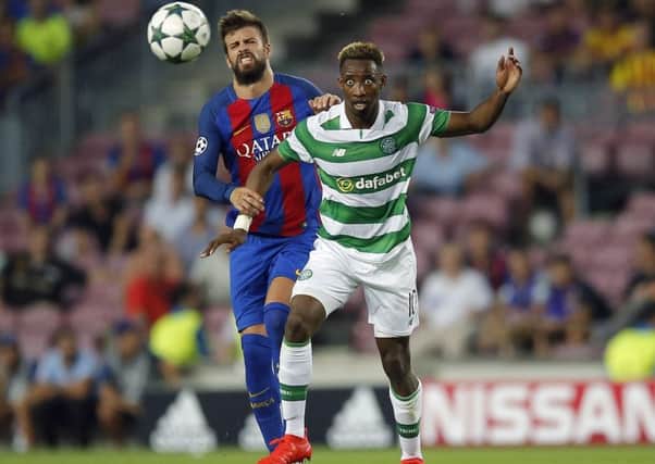Celtic's Moussa Dembele, right, is believed to be tracked by Barcelona and Real Madrid. (AP Photo/Manu Fernandez)