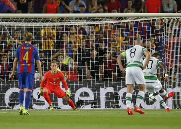 Moussa Dembele strikes the penalty that would be saved by Marc-Andre ter Stegen. Picture: AP