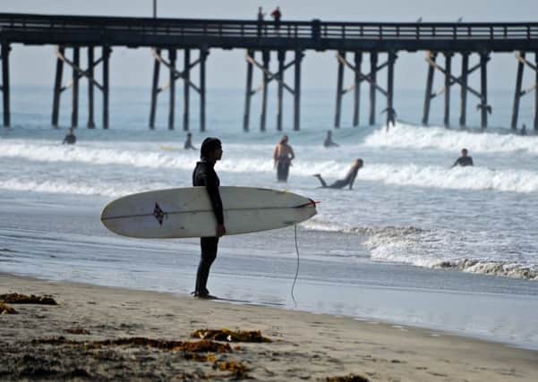 Surfers at Newport Beach, California PIC: Lisa Young