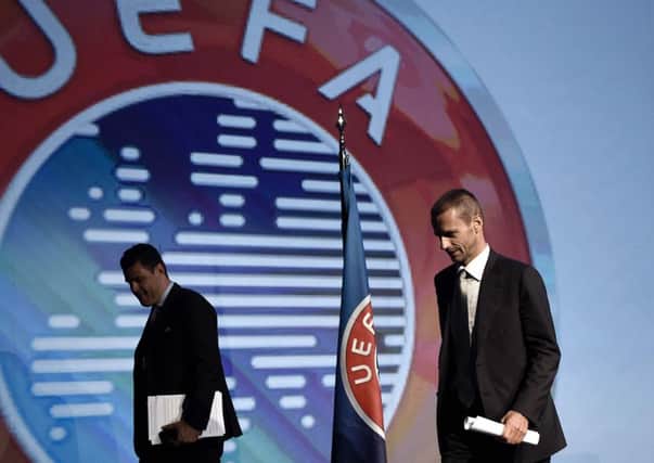 Uefa's newly elected president, Aleksander Ceferin of Slovenia, right, will replace Michel Platini. Picture: Aris Messinis/AFP/Getty Images