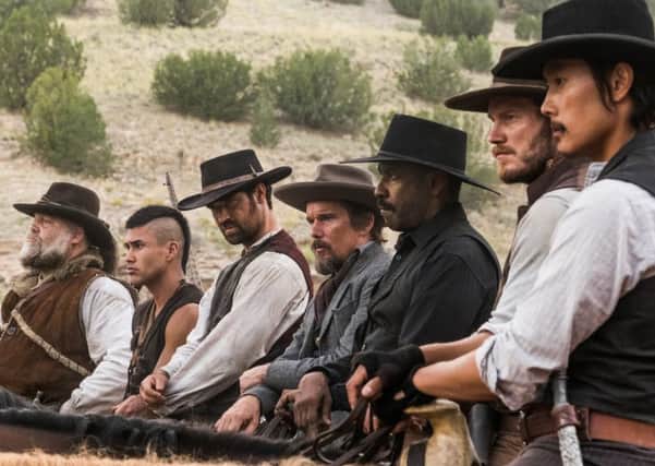The  Magnificent Seven, from left to right: Vincent D'Onofrio, Martin Sensmeier, Manuel Garcia-Rulfo, Ethan Hawke, Denzel Washington, Chris Pratt and Byung-hun Lee
